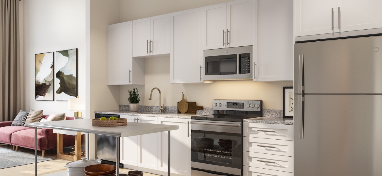 West Charlotte Apartments Kitchen at our luxury apartments in Charlotte with stainless steel appliances and white cabinets.